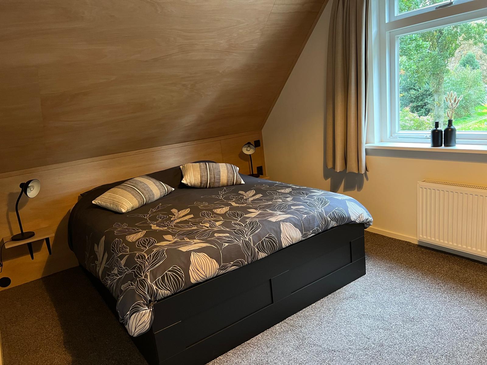 Tweepersoons kamer met losse bedden